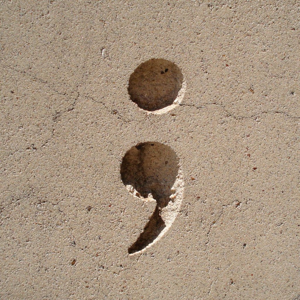 Semicolon in the sand